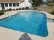 Relaxing kidney-shaped pool ready for summer fun at 4960 Se 17Th St, Ocala, FL 34471
