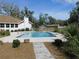 Sparkling pool with wooden walkway at 4960 Se 17Th St, Ocala, FL 34471