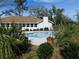 Inviting pool with lush landscaping in backyard at 4960 Se 17Th St, Ocala, FL 34471