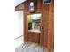Built-in wet bar with glass shelving and sink at 4960 Se 17Th St, Ocala, FL 34471