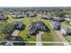 Aerial view of house and neighborhood at 5141 Greens Dr, Lady Lake, FL 32159