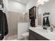 Clean bathroom with shower, toilet and modern vanity at 5141 Greens Dr, Lady Lake, FL 32159