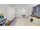 Bright bedroom with ensuite bathroom access and built-in shelving at 5141 Greens Dr, Lady Lake, FL 32159