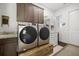 Laundry room with washer, dryer, and extra counter space at 5141 Greens Dr, Lady Lake, FL 32159