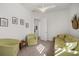 Bright sitting area with comfortable seating and calming decor at 5141 Greens Dr, Lady Lake, FL 32159