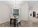 Cozy breakfast nook with round table and chairs at 6303 Sw 116Th Street Rd, Ocala, FL 34476