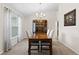 Spacious dining room with a china cabinet and large table at 6303 Sw 116Th Street Rd, Ocala, FL 34476