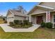 House exterior with a welcoming front porch at 6303 Sw 116Th Street Rd, Ocala, FL 34476