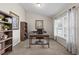 Bright home office features built-in shelving and large window at 6303 Sw 116Th Street Rd, Ocala, FL 34476