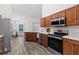 Modern kitchen with stainless steel appliances at 6303 Sw 116Th Street Rd, Ocala, FL 34476
