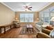 Relaxing living room with hardwood floors and ample natural light at 7254 Sw 95Th Ave, Ocala, FL 34481