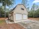 Detached two-car garage with extra storage space at 801 Nw 75Th Ter, Ocala, FL 34482