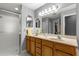 Double vanity bathroom with walk-in shower at 8125 Sw 81St Loop, Ocala, FL 34476