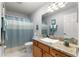 Clean bathroom with granite vanity and shower/tub at 8125 Sw 81St Loop, Ocala, FL 34476