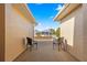 Backyard patio with two chairs, offering a view of the neighborhood at 8125 Sw 81St Loop, Ocala, FL 34476