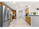 Modern kitchen with stainless steel appliances and wood cabinets at 8125 Sw 81St Loop, Ocala, FL 34476