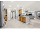 Open concept kitchen with island and stainless steel appliances at 8125 Sw 81St Loop, Ocala, FL 34476