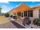 Covered patio with comfortable seating and a view of the yard at 8125 Sw 81St Loop, Ocala, FL 34476