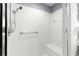 Large walk-in shower with tiled walls and built-in seat at 8125 Sw 81St Loop, Ocala, FL 34476