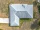 Aerial view of the home's roof, driveway and landscaping at 8574 Sw 60Th Ct, Ocala, FL 34476