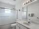 Bright bathroom featuring a shower-tub combo and single sink vanity at 8574 Sw 60Th Ct, Ocala, FL 34476