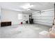 Spacious two car garage with concrete floor and plenty of room for storage at 8574 Sw 60Th Ct, Ocala, FL 34476