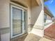 Inviting house entrance with a storm door and brick tile flooring at 8574 Sw 60Th Ct, Ocala, FL 34476