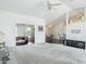 Bright living area with high ceilings, hardwood floors, ceiling fans, and an open floor plan at 8574 Sw 60Th Ct, Ocala, FL 34476