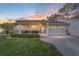 Charming single-story home with well-manicured lawn, cozy front porch, and attached two-car garage at 8648 Sw 95Th Ln # A, Ocala, FL 34481