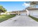 Charming single-story home with well-manicured lawn, cozy front porch, and attached two-car garage at 8648 Sw 95Th Ln # A, Ocala, FL 34481