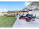 Charming single-story home with a well-manicured lawn, covered porch, and attached two-car garage at 8648 Sw 95Th Ln # A, Ocala, FL 34481