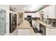 Updated kitchen with stainless steel appliances, bright lighting, and center island at 8648 Sw 95Th Ln # A, Ocala, FL 34481