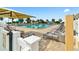 The community pool is surrounded by lounge chairs and palm trees, offering a refreshing oasis for residents at 8648 Sw 95Th Ln # A, Ocala, FL 34481