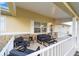 Inviting covered porch with comfortable seating, ideal for enjoying the outdoors at 8648 Sw 95Th Ln # A, Ocala, FL 34481