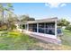Cozy screened-in porch with ample sunlight, offering a relaxing outdoor living space at 8648 Sw 95Th Ln # A, Ocala, FL 34481