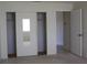 Spacious bedroom closet with mirrored sliding doors at 8667 Sw 108Th Pl, Ocala, FL 34481