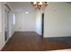 Bright dining room with wood flooring and access to a patio at 8667 Sw 108Th Pl, Ocala, FL 34481