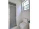 Bathroom with shower and toilet at 10043 Sw 202Nd Cir, Dunnellon, FL 34431