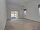 Main bedroom with sliding door to backyard at 10043 Sw 202Nd Cir, Dunnellon, FL 34431