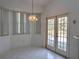 Breakfast nook with French doors leading to the backyard at 10043 Sw 202Nd Cir, Dunnellon, FL 34431