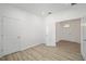 A light and bright bedroom with recessed lighting and modern wood look flooring at 10322 Sw 99Th Ln, Ocala, FL 34481