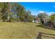 Large backyard with trampoline and shed at 10425 Se 159Th Lane, Summerfield, FL 34491