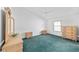 Bedroom featuring carpeted floors, neutral paint, a ceiling fan, and natural light at 1112 Carvello Dr, The Villages, FL 32162