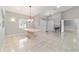 Dining area with tile floors and elegant chandelier at 1133 Se 24Th Ter, Ocala, FL 34471