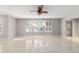 Living room with bay window and ceiling fan at 1133 Se 24Th Ter, Ocala, FL 34471