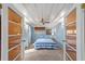 Stylish bedroom with a ceiling fan, and glass doors leading to other areas at 114 Ne 11Th Ave, Ocala, FL 34470