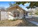 Bungalow style home with a wood fence and walkway at 114 Ne 11Th Ave, Ocala, FL 34470