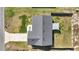 Aerial view of the house showing the driveway and fenced backyard with sunshade at 13787 Sw 43Rd Cir, Ocala, FL 34473