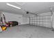 This garage offers a large amount of open space and shelving on the left wall at 13787 Sw 43Rd Cir, Ocala, FL 34473