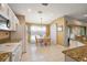 Breakfast nook area with table and chairs, adjacent to kitchen at 14315 Se 85Th Ave, Summerfield, FL 34491